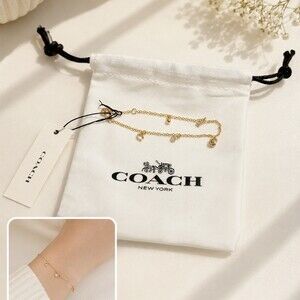 Coach Dainty Charm Bracelet Gold Clear Crystal Accents Dangle Charms cute gift